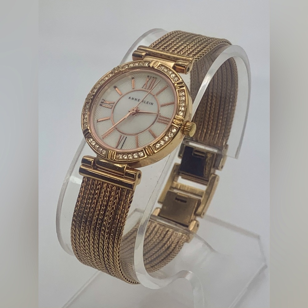 Anne Klein AK/2144RP premium crystal accent rose gold tone chain bracelet watch